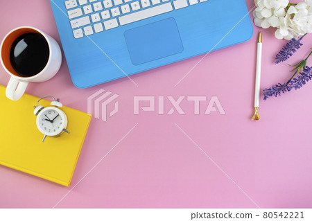 Blue notebook, yellow diary and coffee on a pink background Blue notebook, yellow diary and coffee on a pink background 80542221