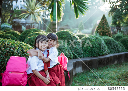 happy student friend in uniform smiling happy student friend in uniform smiling 80542533