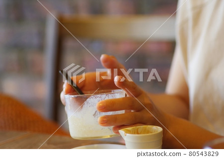 Woman eating ice cream dessert Woman eating ice cream dessert 80543829