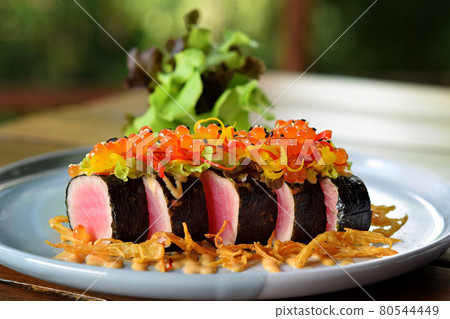 Seared tuna with spicy sauce Seared tuna with spicy sauce 80544449