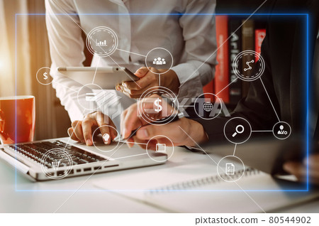 business using laptop and digital tablet with marketing  virtual icon . 80544902