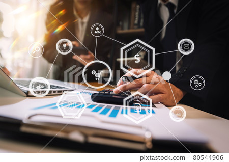 Business hand using laptop, tablet and smartphone in office. Business hand using laptop, tablet and smartphone in office. 80544906