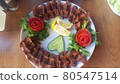 Cig kofte (raw meatball) with lettuce, tomato, pickle and lemon on the white plate. Turkish food Raw Meat ( Cig Kofte ) from traditional Turkish cuisine 80547514