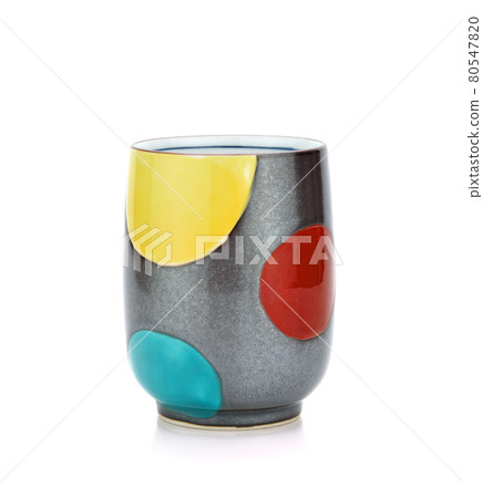 Colorful patterned ceramic cup isolated on white background Colorful patterned ceramic cup isolated on white background 80547820