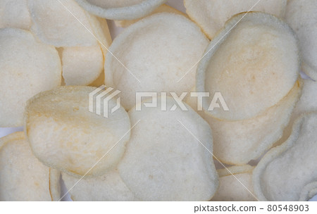 Crabbread chips on a white surface 80548903