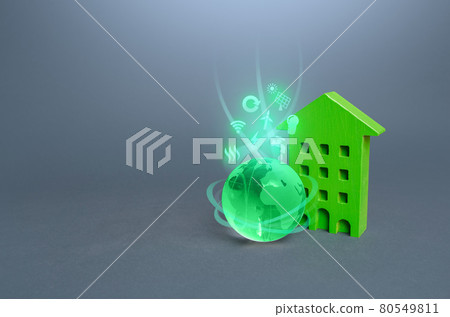 Green multi-storey residential building and globe with environmental symbols. High demands, standards of housing. Environmentally friendly, energy efficiency, zero carbon emissions. Carbon neutrality. 80549811
