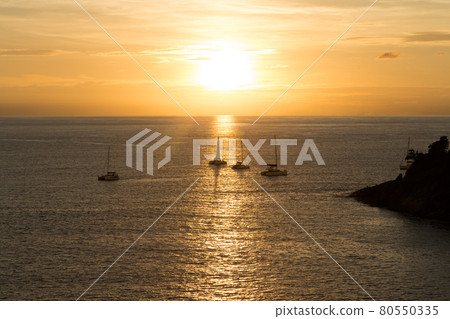 Silhouette yacht. Boat on the andaman sea at sunset in Phuket, Thailand Silhouette yacht. Boat on the andaman sea at sunset in Phuket, Thailand 80550335