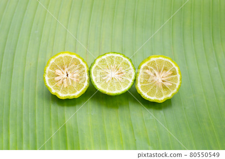 Bergamot kaffir lime herb on banana leaf Bergamot kaffir lime herb on banana leaf 80550549