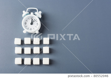 sugar cube sweet food ingredient geometry pattern and alarm clock sugar cube sweet food ingredient geometry pattern and alarm clock 80552046