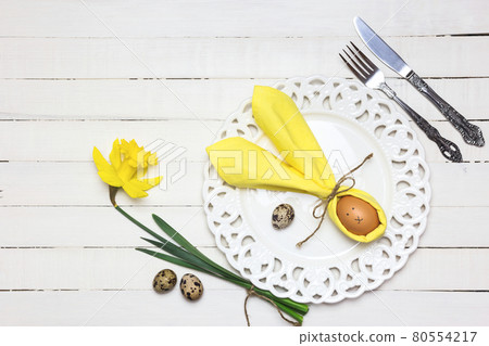 Festive Easter table setting Festive Easter table setting 80554217