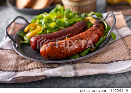 Grilled spicy sausages Grilled spicy sausages 80554349