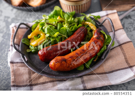 Grilled spicy sausages Grilled spicy sausages 80554351