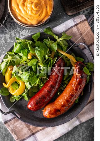 Grilled spicy sausages Grilled spicy sausages 80554355