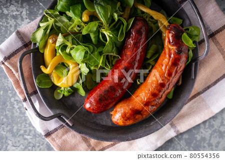Grilled spicy sausages 80554356