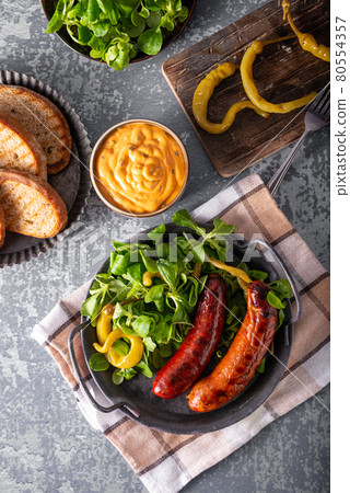 Grilled spicy sausages Grilled spicy sausages 80554357