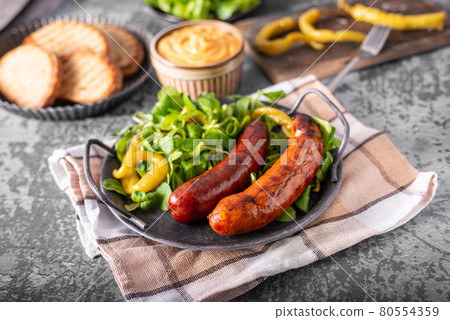 Grilled spicy sausages 80554359