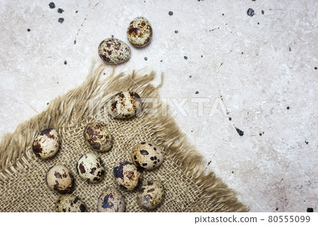 Quail eggs on light background 80555099