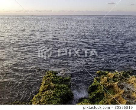 Rocks in front of Malecon and Atlantic Ocean - Havana, Cuba  80556819