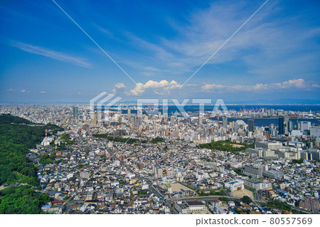 Aerial view of the entire cityscape of Kobe in Hyogo prefecture from the sky above the mountain side to the east with a drone (available for real estate advertising) 80557569