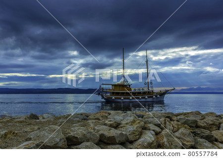 Adriatic Sea with floating ship - Brela, Makarska Riviera, Croatia 80557784