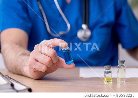 Old male doctor in vaccination concept Old male doctor in vaccination concept 80558223