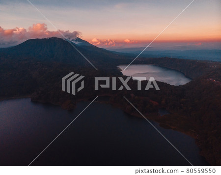 Aerial view in mountains with sunrise and lake in Bali 80559550