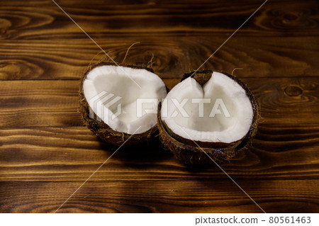 Fresh ripe coconut on rustic wooden table 80561463