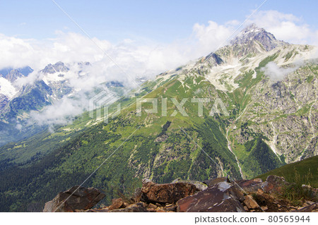 The Caucasus Mountains. Mountain peaks in summer. The Caucasus Mountains. Mountain peaks in summer. 80565944