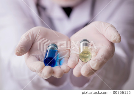 Old male doctor in vaccination concept 80566135