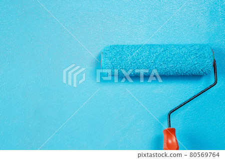 Painter is painting the interior wall Blue Painter is painting the interior wall Blue 80569764