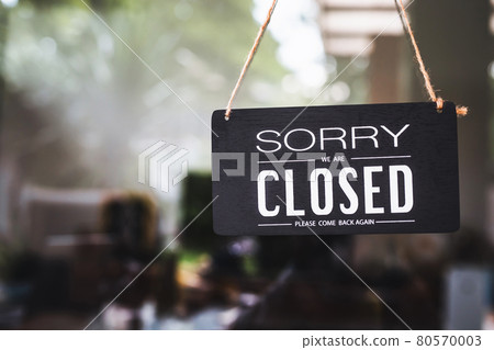 sorry closed sign on shop door. Text on cafe front or restaurant hang on door at entrance. vintage tone style. sorry closed sign on shop door. Text on cafe front or restaurant hang on door at entrance. vintage tone style. 80570003