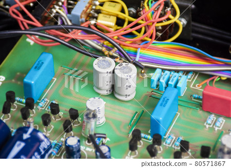 Non polarized capacitor row on electronic circuit board and electronics component Non polarized capacitor row on electronic circuit board and electronics component 80571867