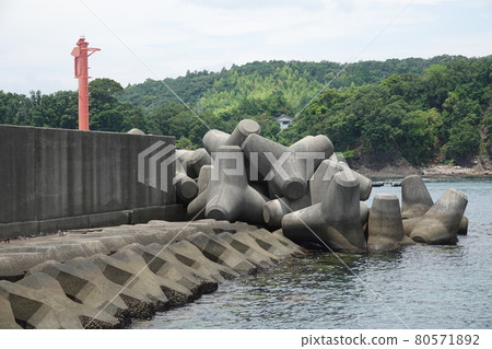 Tetrapod and lighthouse at Higashi Mugi Port 80571892