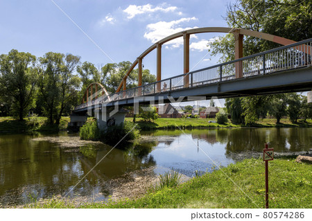 Belgorod, Russia - July 08, 2021: View of the Bridge Over The Vezelka River In Victory Park In The Center of Belgorod 80574286