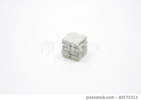 the Many canvas bags stacked in a pile. Packages stacked in neat rows the Many canvas bags stacked in a pile. Packages stacked in neat rows 80575313