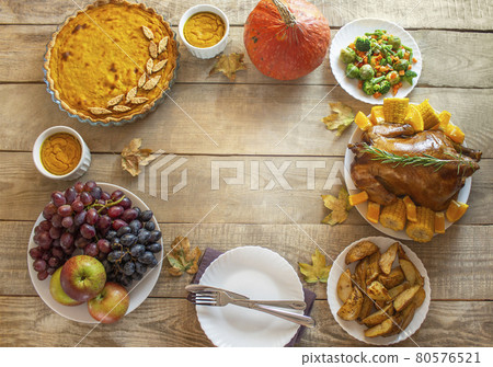 Thanksgiving Day. Chicken close-up. thanksgiving. pumpkins and fruits. View from above. Copy space Thanksgiving Day. Chicken close-up. thanksgiving. pumpkins and fruits. View from above. Copy space 80576521