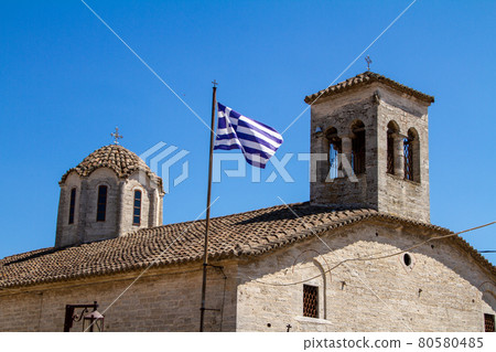 Greece, Afytos, Greek Flag on Agios Dimitrios Orthodox Church Greece, Afytos, Greek Flag on Agios Dimitrios Orthodox Church 80580485