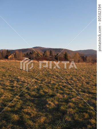 Beskid Mountains, Bielsko-Biala city in Poland at sun set - vertical 80582394