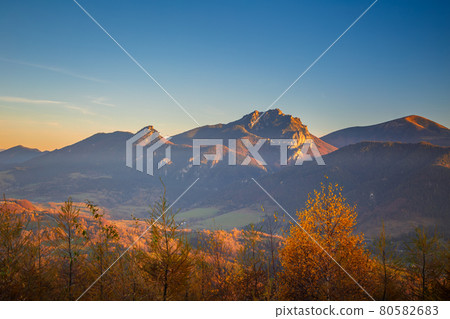 Autumn rural landscape with mountains peaks on background. 80582683