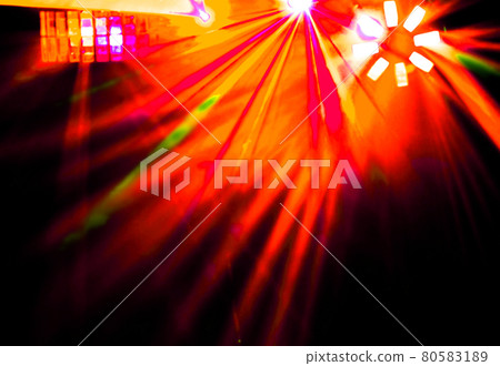 Lighting disco with bright beams of searchlight and laser show. Lighting disco with bright beams of searchlight and laser show. 80583189