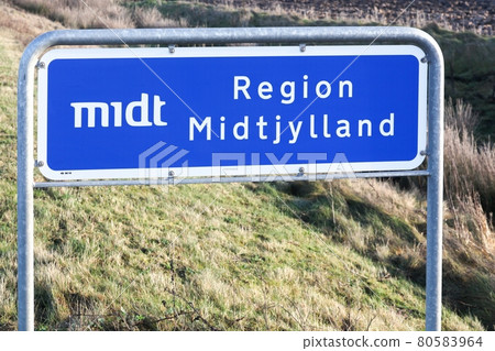 Central Denmark region called Midyjylland in danish road sign in Denmark 80583964