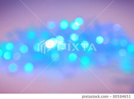 festive blurred background with bright blue lights. festive blurred background with bright blue lights. 80584651