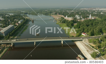 Aerial shot of Veliky Novgorod involving Novgorod Kremlin fortress and the Volkhov river. Russia Aerial shot of Veliky Novgorod involving Novgorod Kremlin fortress and the Volkhov river. Russia 80586403