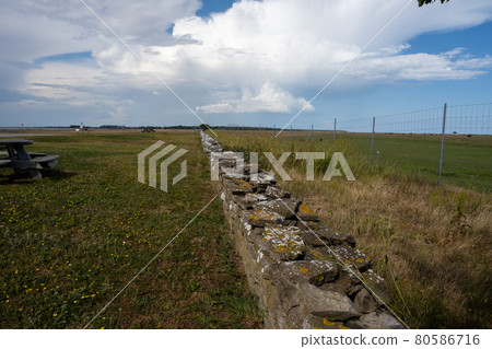 A limestone wall in a moor landscape A limestone wall in a moor landscape 80586716