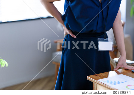 Suffering from back pain 80589874