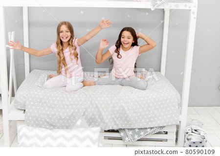 Kids girls sisters best friends full of energy in cheerful Kids girls sisters best friends full of energy in cheerful 80590109