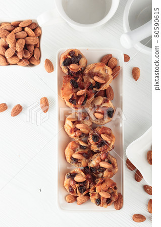 Small cakes with almonds, raisins, and honey. 80590615