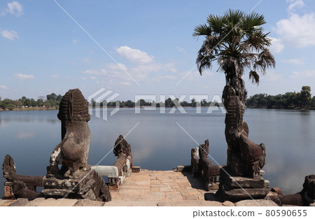 Angkor Wat archaeological site, Srah Srang (reservoir) and blue sky / Cambodian landscape Angkor Wat archaeological site, Srah Srang (reservoir) and blue sky / Cambodian landscape 80590655