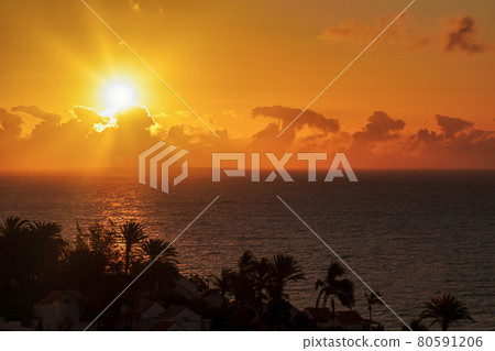 bright sunrise on the east coast of Fuerteventura bright sunrise on the east coast of Fuerteventura 80591206