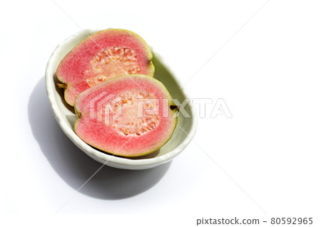 Fresh pink guava on white background. Fresh pink guava on white background. 80592965